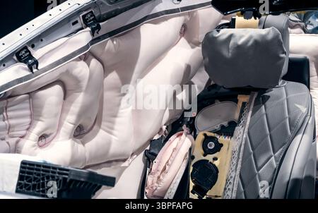 Airbags deployed in a modern Mercedes-Benz car in a safety demonstration at the IAA Mobility 2021 motor show in Munich, Germany - September 6, 2021. Stock Photo