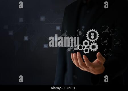 Business man using AI robots to help analyze and increase efficiency in business Stock Photo