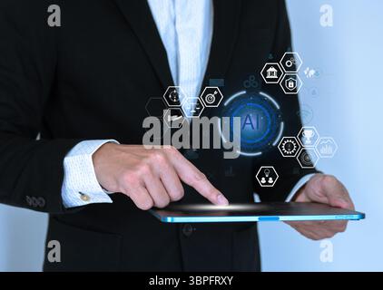 Business man use artificial intelligence AI help in business job. Stock Photo