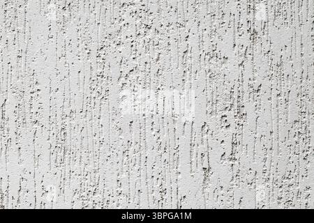 background plastered uneven wall surface with furrows Stock Photo