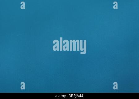 Abstract flat design is showing uniform teal-blue background with subtle texture filling full frame Stock Photo