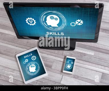 Skills concept shown on different information technology devices Stock Photo