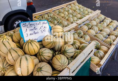 Melons on sale at local market, Doue, France Stock Photo