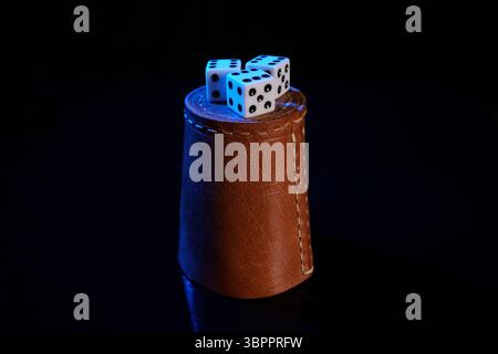 Dice cup with dice, 6-pack, blue light Stock Photo