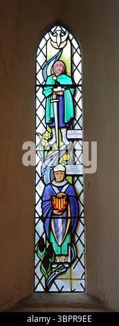Stained glass window depicting Earl Byrhtnoth and Bishop Hugh Balsham, St George's Church, Thriplow. Stock Photo