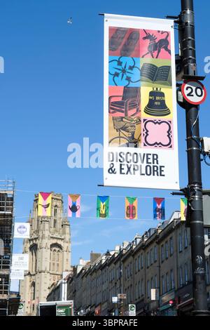 Public Art instalation PS. with Love  vibrant flags and Banners on Park Street Bristol UK stories and symbols that shape the area By Nick Hand and Han Stock Photo