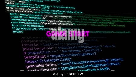 Displaying neon pink-purple GAME START glowing on computer screen at angle, with code snippets Stock Photo