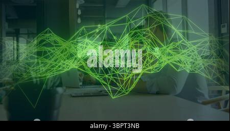 Green geometric network image over people working at office table Stock Photo