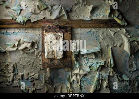 Rusting forgotten clipboard in abandoned building, Indiana, USA Stock Photo
