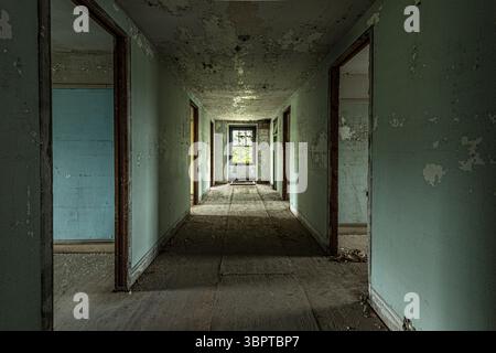 Empty hall hallway in abandoned building, Indiana, USA Stock Photo