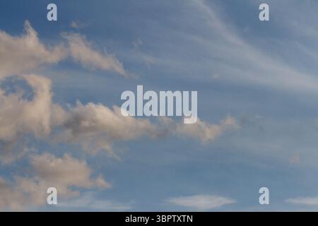 Cumulus and cirrus clouds in a blue sky. Kanagawa, Japan. Stock Photo