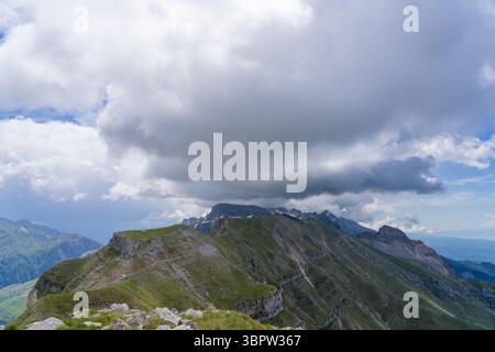 A Ridgeline in the Tzoumerka Mountains With Storm Clouds Forming Over the Peaks in Greece Stock Photo