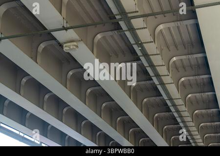 Upper roof of the elevated highway. Massive construction of transport infrastructure. Stock Photo