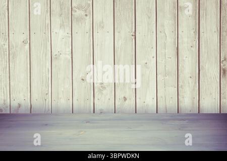 Flat design showing pale wooden tabletop in muted beige tones with weathered plank backdrop Stock Photo