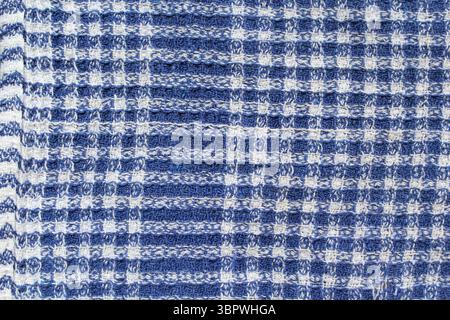 Blue and white checked pattern cloth fabric textured close up background Stock Photo