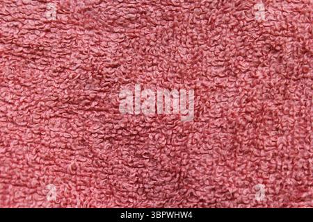 Pink fabric cloth close up textured background Stock Photo