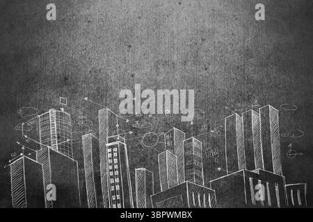 Chalk-drawn city skyline is appearing on dark grey chalkboard surface with arrows, circles, numbers Stock Photo
