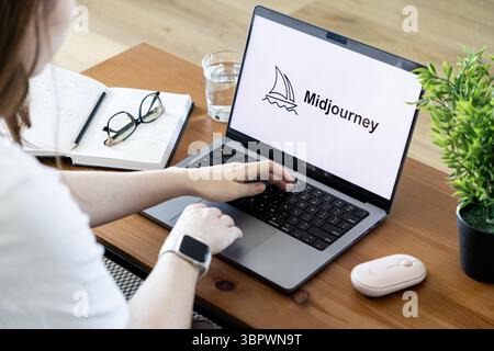 Poznan, Poland - June 15, 2025: Midjourney software interface shown on a powerful laptop, enabling a user to create diverse AI-generated imagery and e Stock Photo