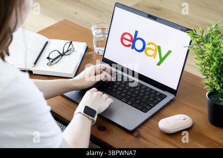 Poznan, Poland - June 15, 2025: View of the eBay platform on a laptop, depicting a user navigating the digital marketplace for buying and selling good Stock Photo