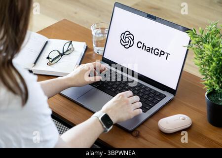 Poznan, Poland - June 15, 2025: ChatGPT application displayed on a laptop screen, providing insights into modern artificial intelligence integration f Stock Photo