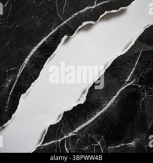 The old black paper was evenly torn on the diagonal with white space in between Stock Photo