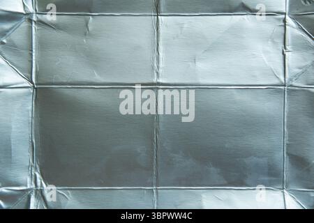 Aluminum foil texture inside carton milk box Stock Photo