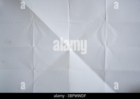 White paper texture with diagonal, vertical and horizontal folded lines Stock Photo