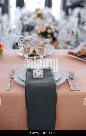 Table set for wedding celebration or another catered event dinner. Selective focus Stock Photo