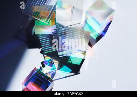 Colorful Reflections. Geometric prisms casting vibrant, multicolored shadows Stock Photo