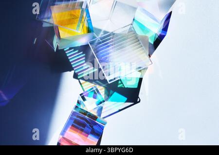 Colorful Reflections. Geometric prisms casting vibrant, multicolored shadows Stock Photo