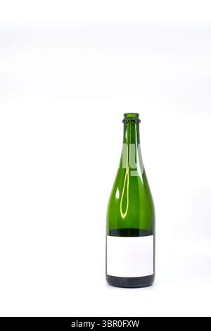 Empty wine bottle with a blank label isolated against a plain white background Stock Photo