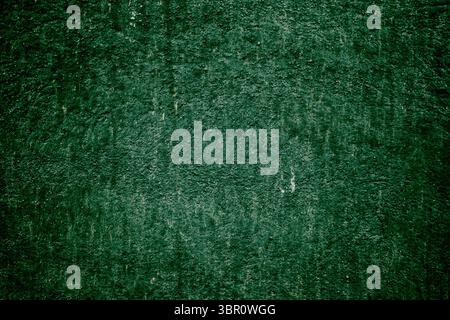 Dark green textured background. Relief texture of a plastered wall Stock Photo