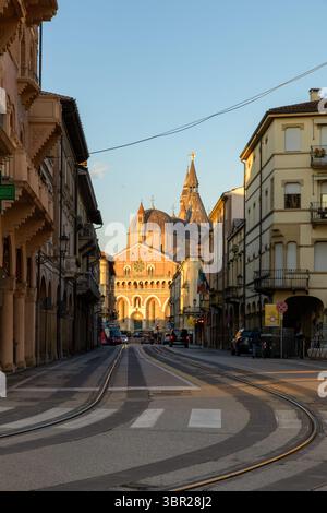 View of a street in the historic center of Padua, Italy, with the Basilica of Saint Anthony in the background, showcasing charming architecture. Stock Photo