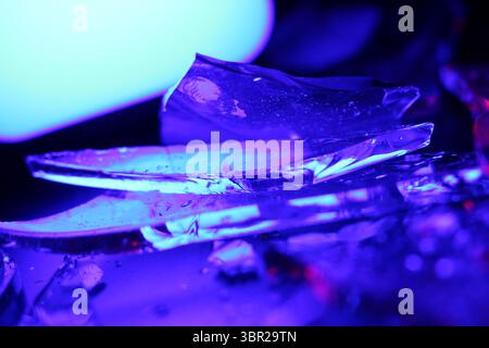 Colorful Abstract Background of Shattered Glass with Vibrant Lighting Stock Photo