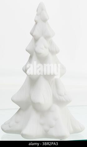 Snow white pine tree decorated for Christmas Stock Photo