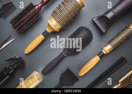 Various hair dresser and cut tools on black background with copy space Stock Photo