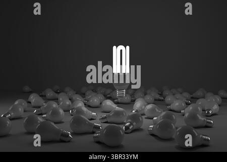 Composite image of lit energy efficient lightbulb over bulbs Stock Photo