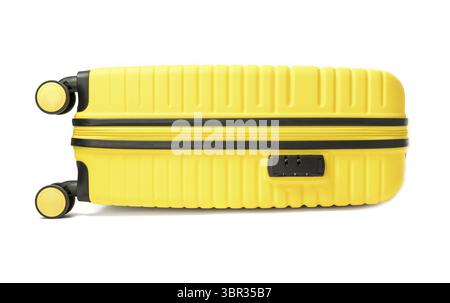 Yellow plastic suitcase isolated on white background Stock Photo