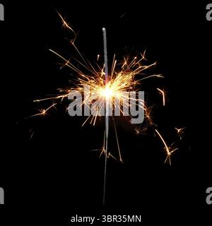 Bengal fire on a black background. Christmas sparkler isolated Stock Photo