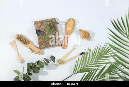 Set of eco friendly body care items, bamboo toothbrushes, wooden massage brushes and combs, natural washcloths, spa and wellness composition, mockup, Stock Photo
