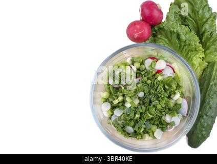 Vegetable salad in deep bowl isolated on white background Stock Photo