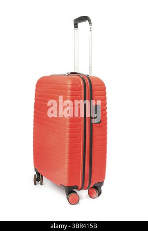 Travel red suitcase on wheels isolated on white background Stock Photo