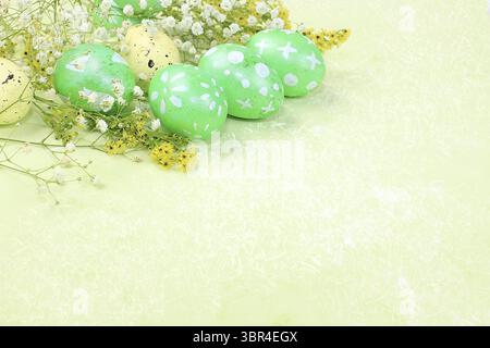 Happy Easter concept, spring card, background. Decorated green Easter eggs on a delicate background. Minimal holiday concept, place for text, banner f Stock Photo