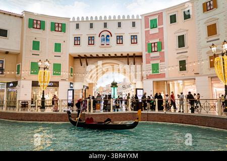 Doha, Qatar - February 2, 2025. Gondola in artificial canal, in Villagio mall, Doha Qatar Stock Photo