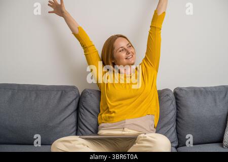 Successful woman. Cheerful, happy woman working from home Stock Photo