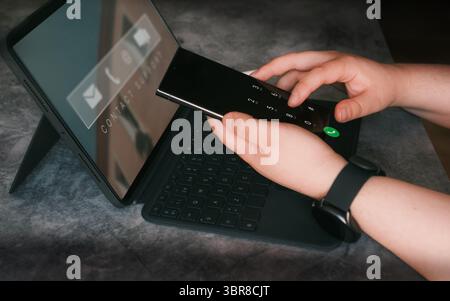 Woman contacting service support customer help call center. Technical Support Center website. Stock Photo
