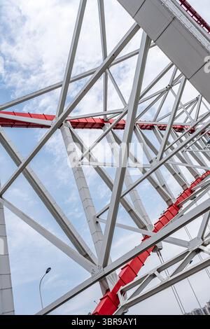steel beams is bolted down. Close-up shows the connection of the metal ...