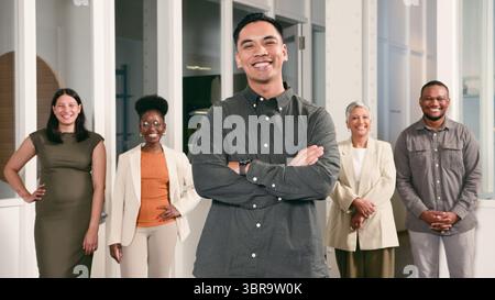 Diverse Team of Confident Professionals Smiling in a Modern Office Environment Stock Photo