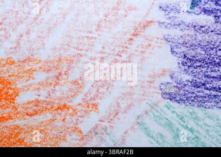 Vibrant hues of chalk blend together on textured paper, showcasing creativity. Stock Photo