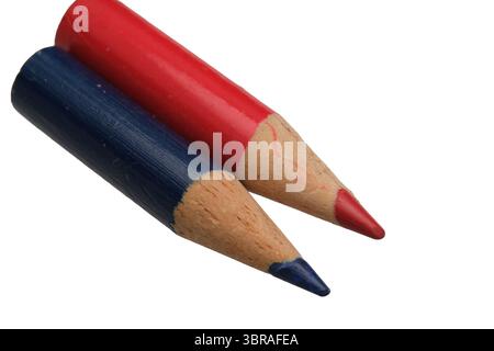 Two vibrant colored pencils lie side by side, ready for creative expression. Stock Photo
